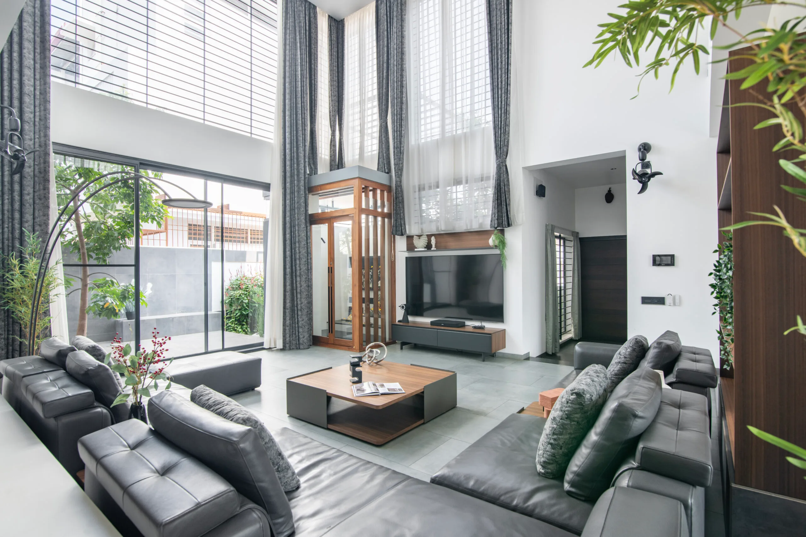 modern-living-room-shree-siddhi-80x60-luxury-house-in-shimoga-6000sft-4BHK-home-terrace-garden-landscaped-pockets