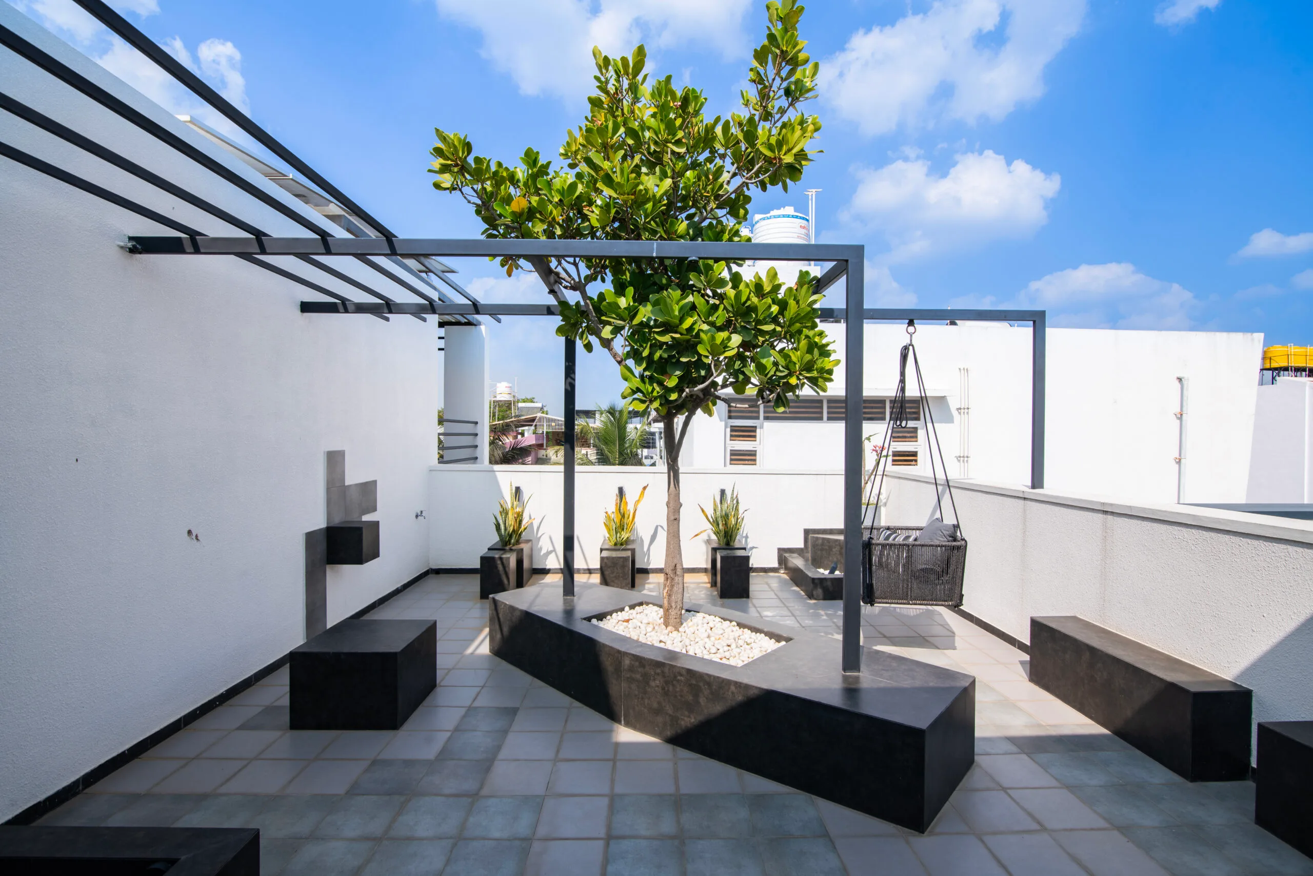 modern-terraces-shree-siddhi-80x60-luxury-house-in-shimoga-6000sft-4BHK-home-terrace-garden-landscaped-pockets